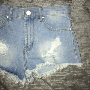 Distressed denim shorts